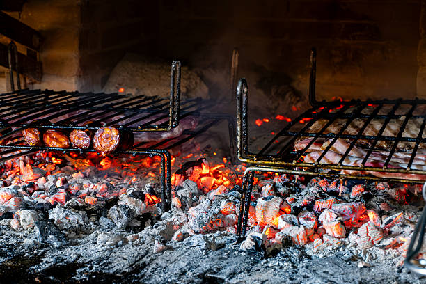 istock Chorizos roasting on a charcoal barbecue 2242552174