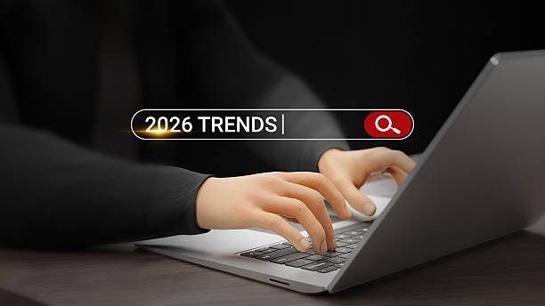 istock AI, cybersecurity, e-commerce, automation, blockchain, finance, healthcare, remote work, biotechnology, sustainability, data analysis. Businessman searching 2026 trends on virtual screen. 3D graphics 2242555900