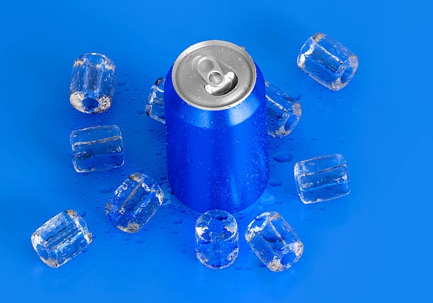 istock Open Blue Refreshing canned drink, and ice cubes on blue background 2242566782