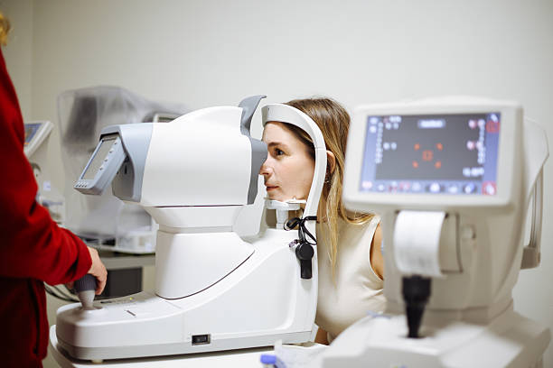 istock Beautiful  woman during her annual eye test check-up 2242567087