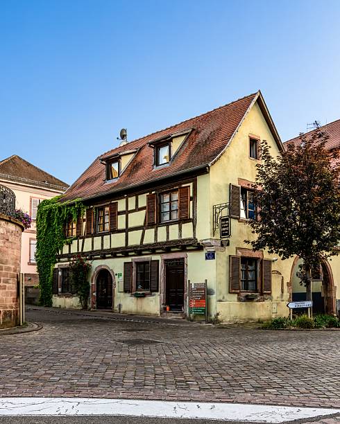 istock Charming half-timbered house on a cobblestone street. 2242568597