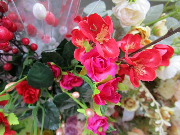 I photographed a bouquet of colorful artificial flowers.