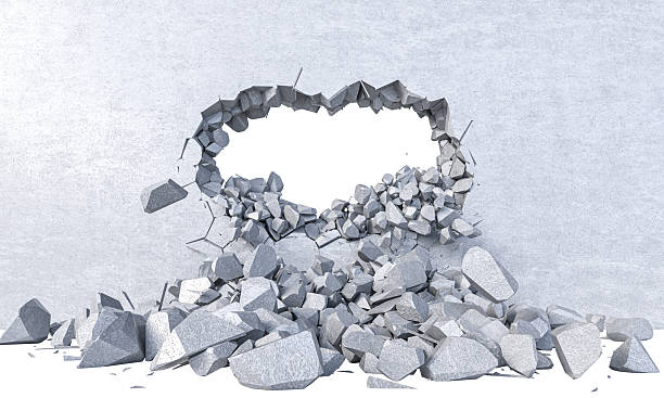 istock Concrete wall breaking through, revealing a clear background 2242568850