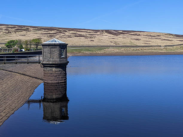 The dam of Walshaw Dean Middle Reservoir, West Yorkshire, on the Pennine Way