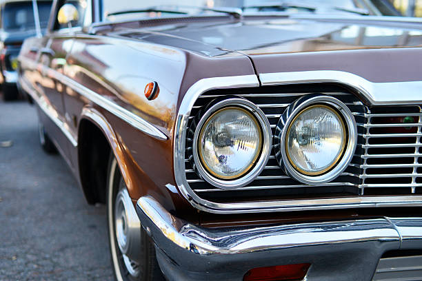 istock Vintage Brown Classic Car Front View with Chrome Details and Dual Headlights 2242570892