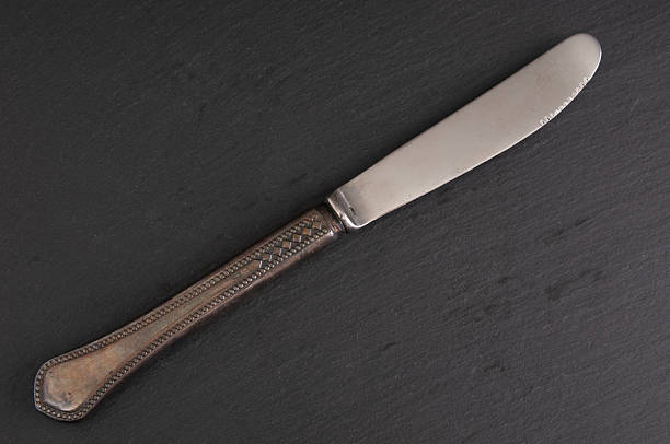 Antique knife close up on a black  background