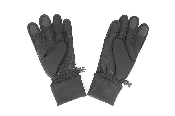 Black winter gloves on a white background