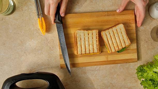 istock Grilled Cheese Sandwiches on a Wooden Cutting Board 2242582250