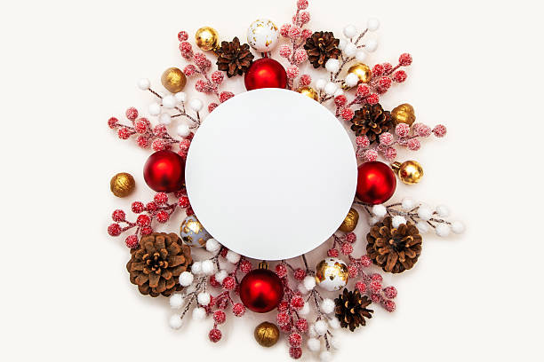 istock Empty round mockup in a Christmas composition with baubles, pinecones and berries. Space for logo, text or holiday message. 2242582336