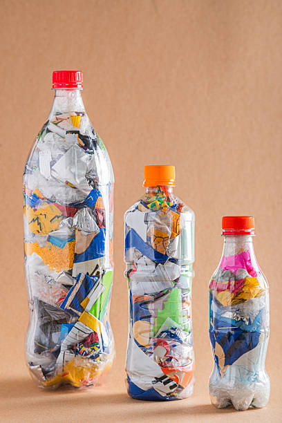 istock PET bottles filled with compacted waste for eco-brick recycling 2242582774