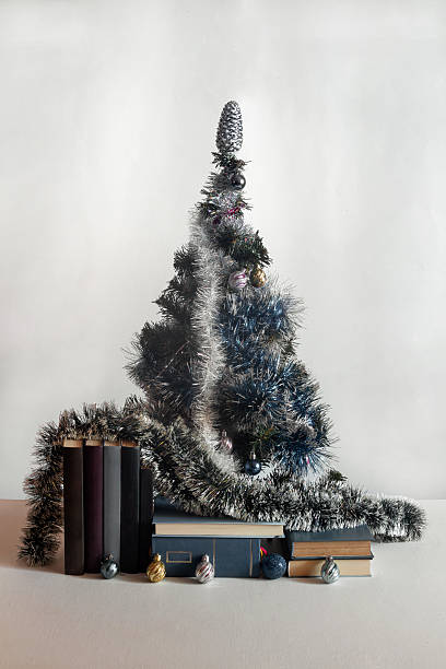 istock On the table are books, a Christmas tree, decorations and balls. 2242590891