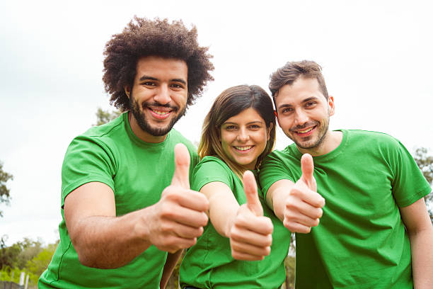istock Confident environmentalists showing thumbs up 2242593650