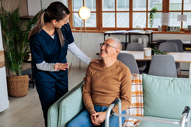 istock Senior Man Receiving Home Visit and Support from a Nurse 2242595379