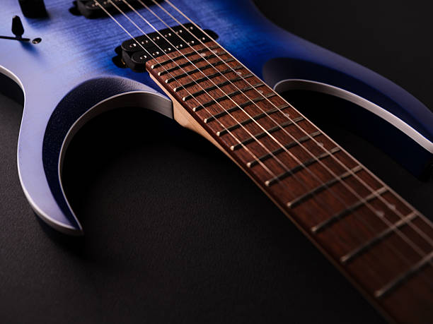 istock Fretboard of modern electric guitar. Close up. 2242595589