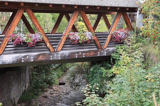 istock Small romantic bridge in St. Ulrich, South Tyrol, Italy 2242596924