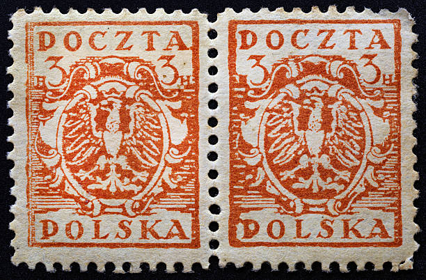 istock POLAND-CIRCA 1921:Two postage stamp printed in Poland shows Eagle on a baroque shield, serie, circa 1921.Philately.Postage stamps of different countries and eras.Collection of stamps of the world. 2242601325
