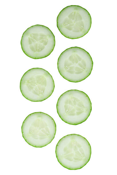 istock Cucumber slices with natural details, isolated object for clean beauty design. 2242604103