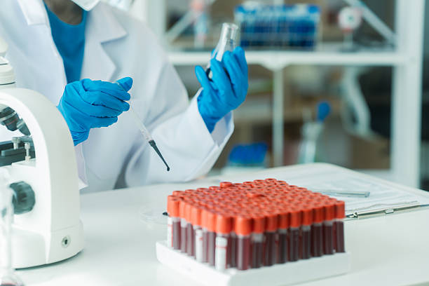 istock Scientists are experimenting with clear liquids in glass test tubes, using modern laboratory medical research. Experiments to develop health innovations. 2242604840