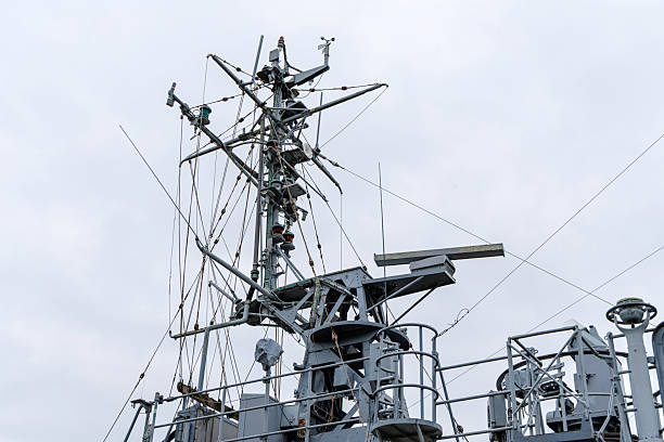 istock Radar and Communication Mast on a Grey Warship 2242607422