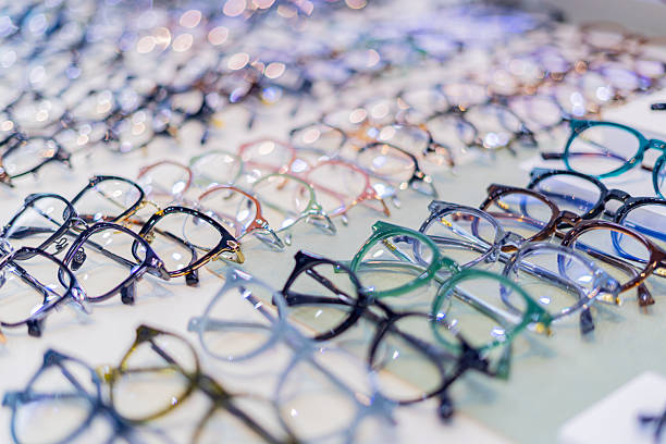 istock Glasses are on display at an eyeglass store. 2242609251