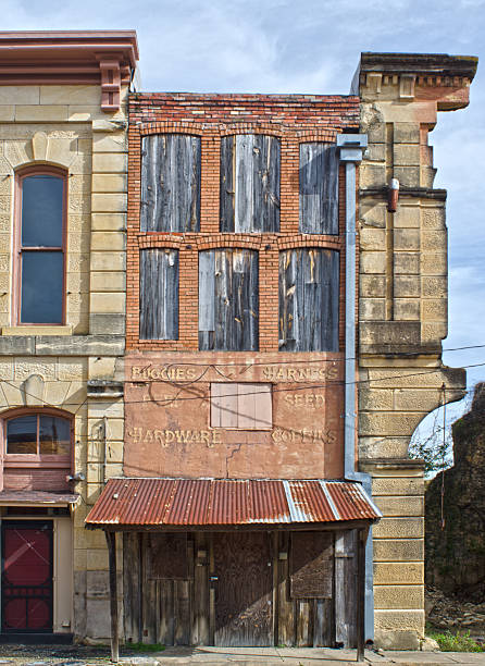 istock Abandoned Hardware Store in City Block 2242612143