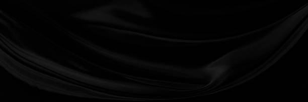 istock Black gray satin dark fabric texture luxurious shiny that is abstract silk cloth panorama background with patterns soft waves blur beautiful. 2242613460