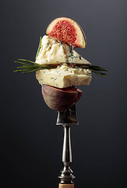 Blue cheese with fresh figs and rosemary.