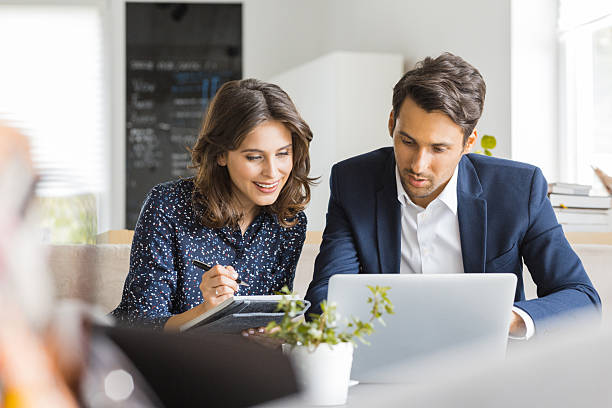 istock Business people working together at coffee shop 2242626859