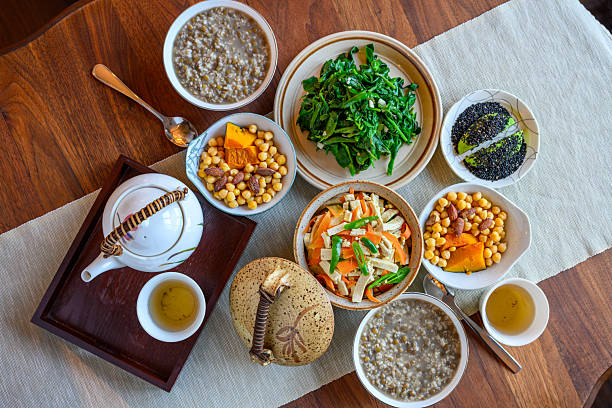 Steamed Hubbard squash, chickpeas, stir fried firm tofu with olive oil, stir fried New Zealand spinach (Tetragonia tetragonioides), lentil oatmeal, avocados with sesame seeds