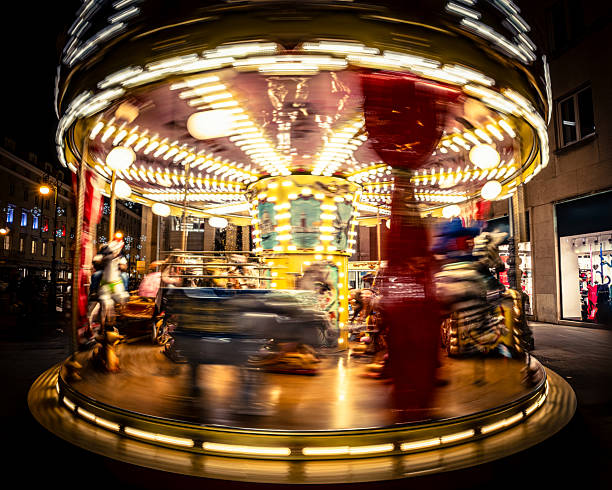 istock Blurred carousel lights at night create a magical, dreamy atmosphere. 2242629868