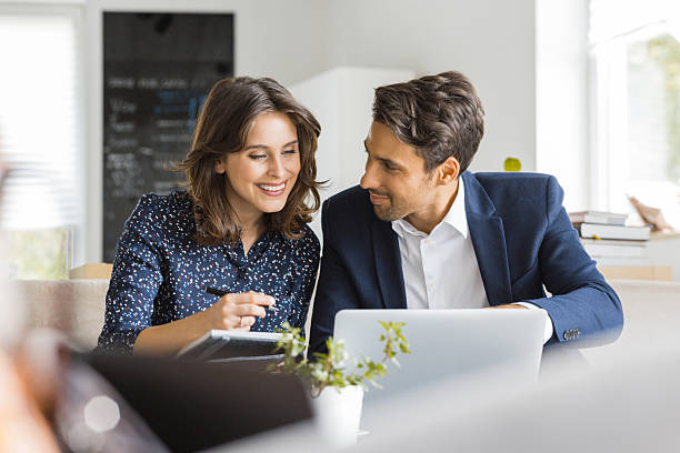 istock Modern business people working at a cafe 2242630296