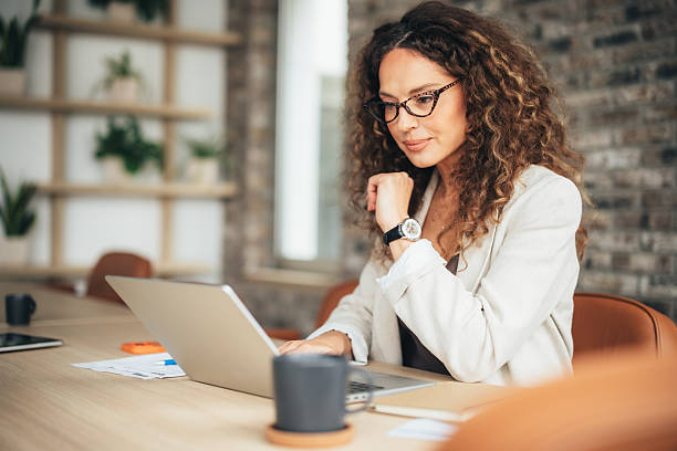 istock Successful female manager working in modern office 2242634109