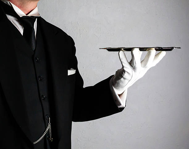 Elegant Butler Holding Service Tray