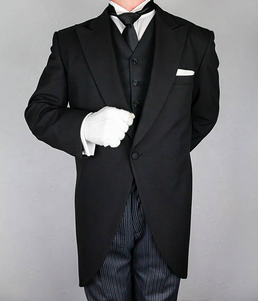 istock Butler Standing at Elegant Attention 2242635482