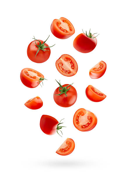 istock Bright red cherry tomatoes - whole, sliced levitation as swirl in art composition, isolated white background. Vegetarian diet food for detox cooking, fitness diet, advertising, label product, design. 2242641289
