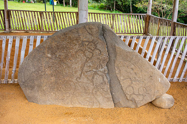 A unique stone sculpture with intricate carvings, showcasing pre-Columbian art in San Agustin, Huila, Colombia, a UNESCO World Heritage site.