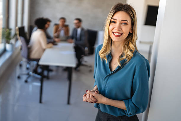 istock Multicultural professional businesspeople working together on research plan in boardroom. 2242647489