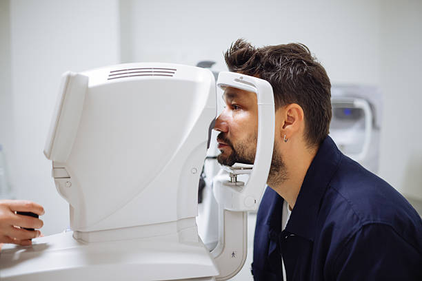 istock Beautiful man during her annual eye test check-up 2242650386
