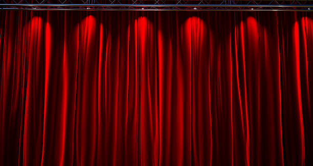 istock Closed red curtain of stage, red stage curtain background 2242652044