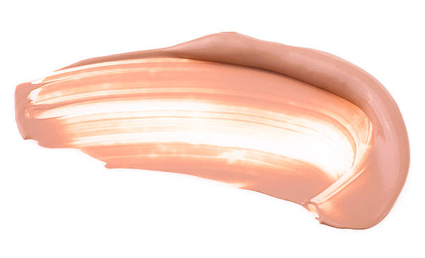 istock Makeup foundation, beige concealer swatch smudge smear isolated on a white background. BB-cream. 2242654834