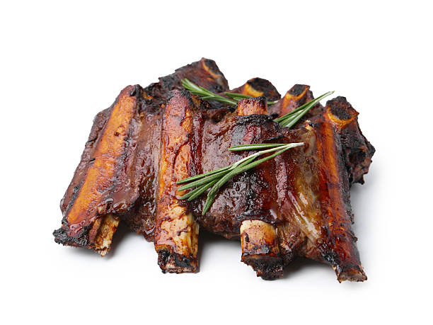 istock Roasted beef ribs with rosemary isolated on white 2242655251