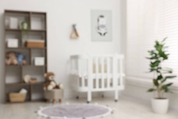 istock Blurred view of baby's room. Interior design 2242655401