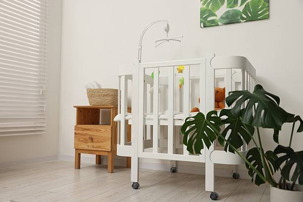 Baby's room with crib and toys. Interior design