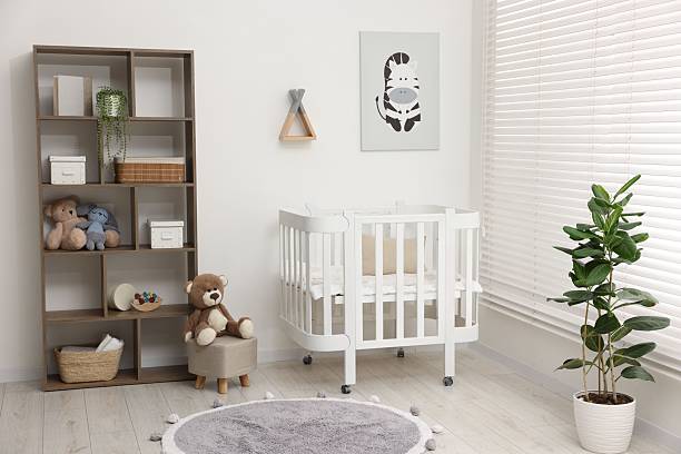 istock Baby's room with crib and toys. Interior design 2242655454