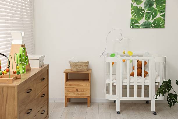 Baby's room with crib and toys. Interior design