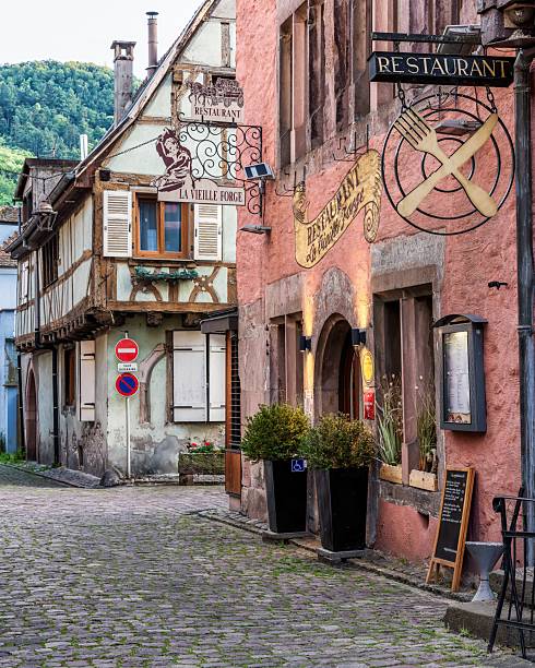 Kaysersberg, France – August 19, 2025: Charming cityscape of Kayserberg, Alsace with medieval architecture at sunset
