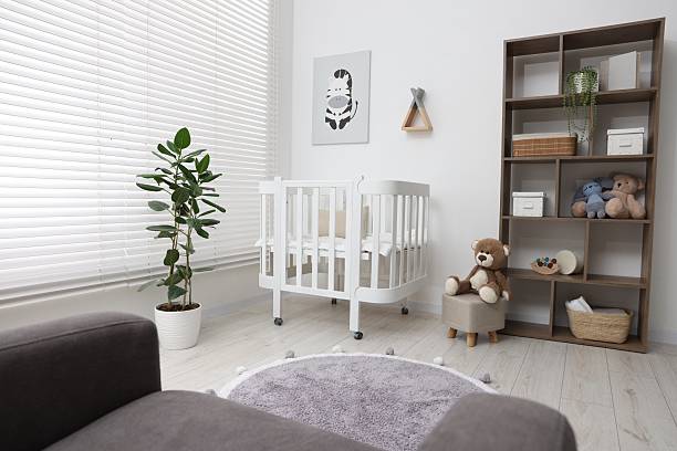istock Baby's room with crib and toys. Interior design 2242655613