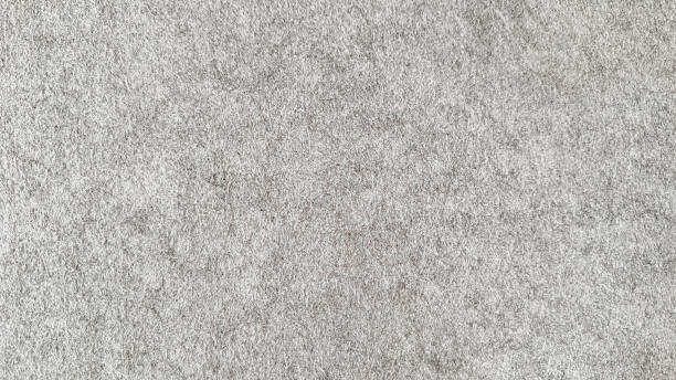 istock Horizontal macro texture of light gray felt – soft textile background for design and craft projects 2242657120