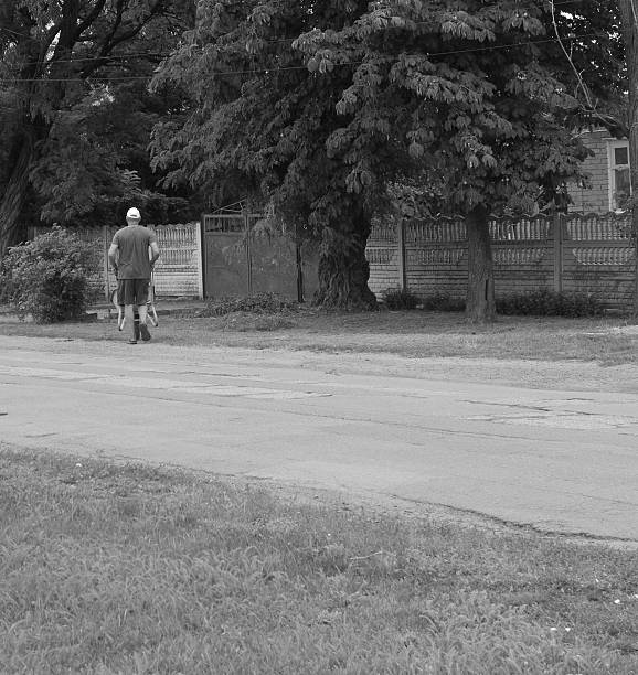 Man working with wheelbarrow in Grod village posluk z objects visible human dorga