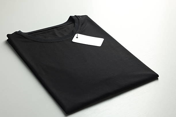 istock Blank black t-shirt on white background, closeup. Mockup for design 2242661121